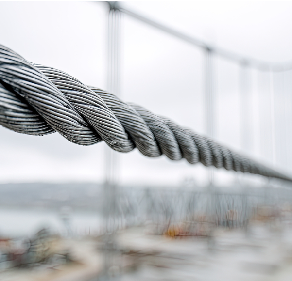 Close-up detail of twisted wire rope strands in industrial application